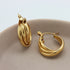Gouden hoops bestaande uit drie ringen