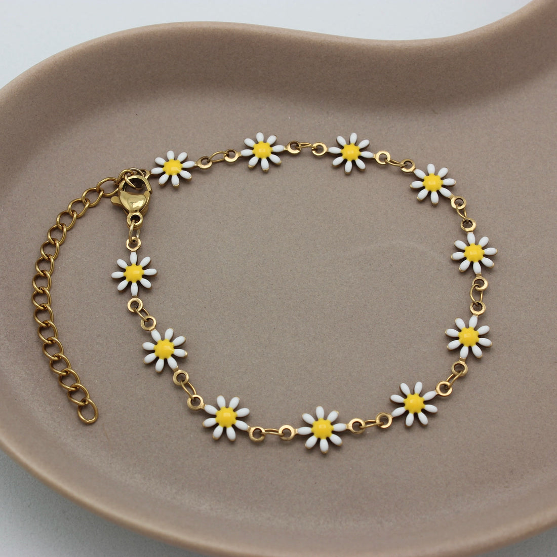 Gouden geschakelde bloemen armband