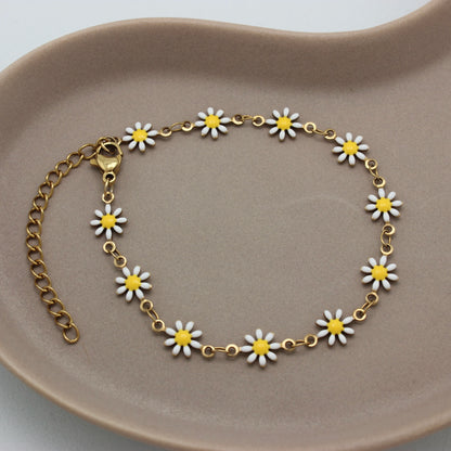 Gouden geschakelde bloemen armband