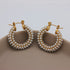 Gouden oorbellen met parels