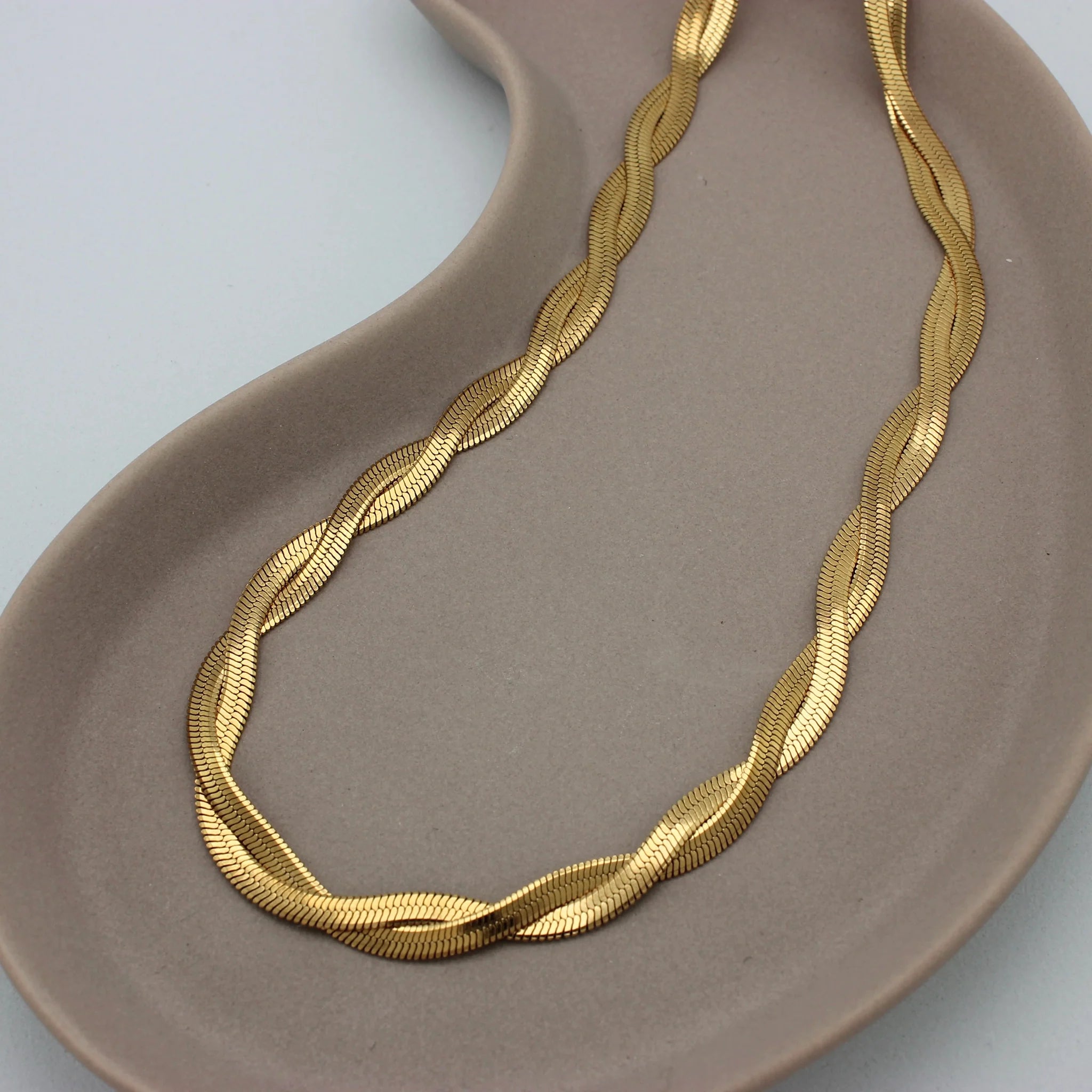 Gouden gevlochten platte ketting