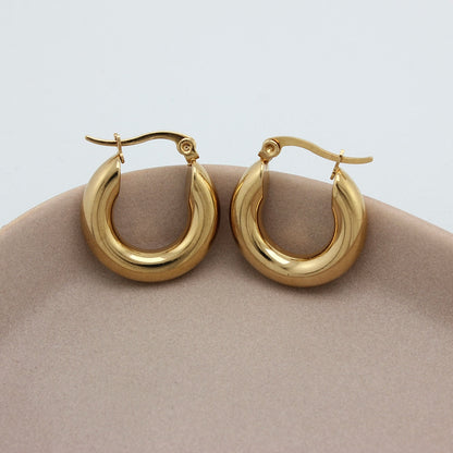 Gouden hoops van zijaanzicht
