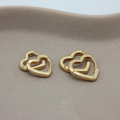 Twee formaten gouden hartjes oorbellen