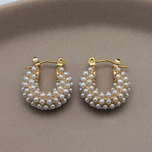 Kleine gouden oorbellen met parels